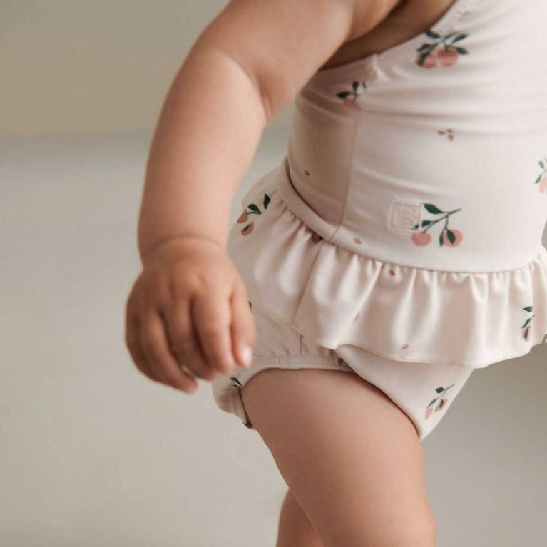 Liewood - Amina Baby Badeanzug aus recyceltem Material - Peach/Sea Shell - 9 Monate (74) - 5715335149953 - littlehipstar.com