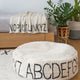 Lorena Canals - Baumwoll-Pouf ABC in Natur/ Schwarz - Ø 70 cm - 8435392619325 - littlehipstar.com
